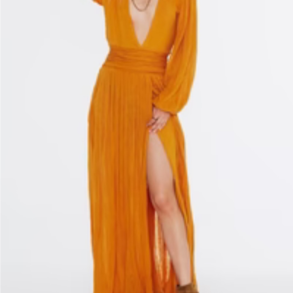 Long sleeve Burnt orange dress. Splits up sides with belt tie